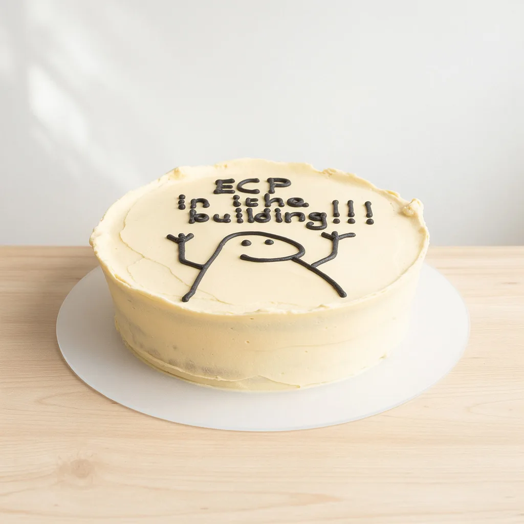 Round cream frosted cake with a simple smiley face and text in black icing